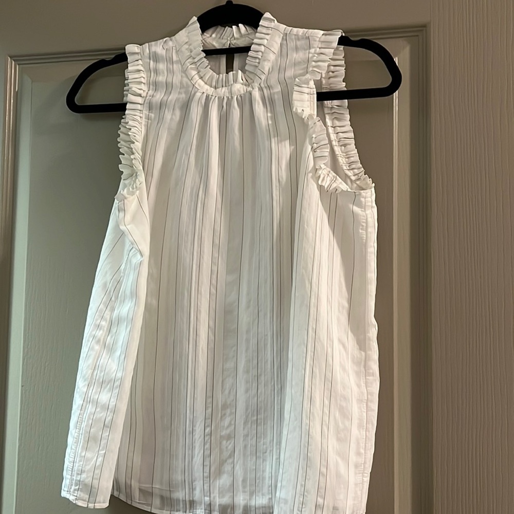 Ruffled black and white sleeveless top